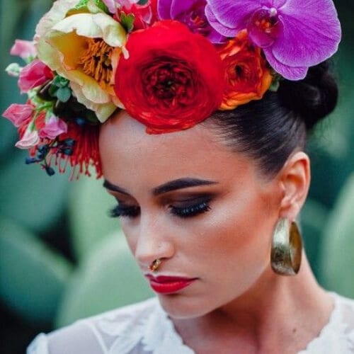 Frida Kahlo style oversize flower crown with orchids wedding updos