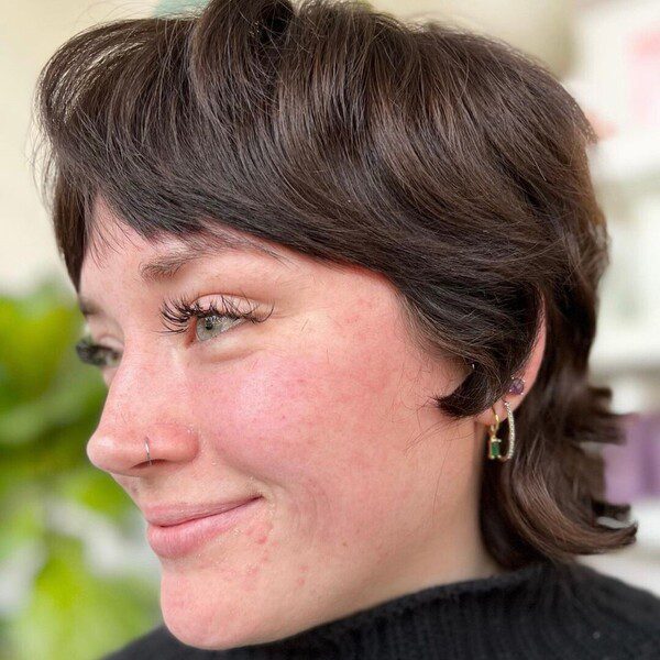 Classy Mixie Haircut - a woman wearing black crochet top.
