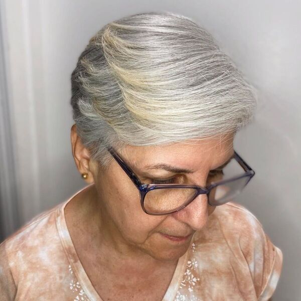 Natural Platinum Feather Pixie - a woman wearing brown dyed blouse with glasses.