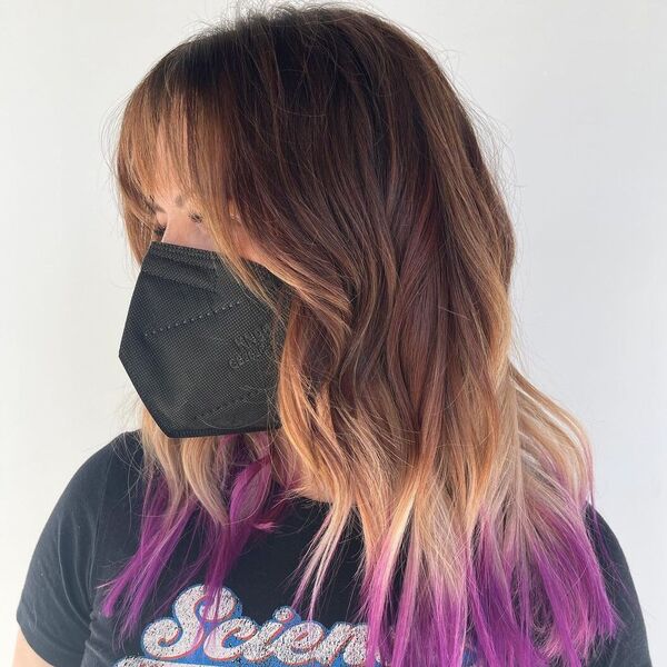 Wispy Fringe with Dip Jam Hairstyle - a woman wearing black mask and printed shirt.