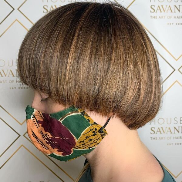 90's Indie Wedge Cut - a woman wearing printed mask.