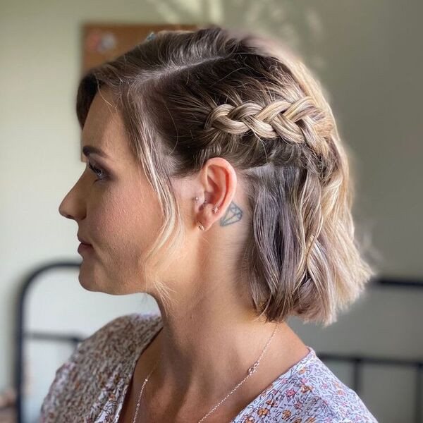 One Side Dutch Braids - a woman wearing floral top.