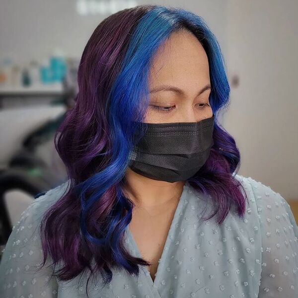 Purple Hair with Blue Money Piece Hair - a woman wearing blouse and mask.